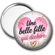 Miroir de poche - une belle fille qui déchire