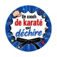 un coach de karaté qui déchire