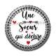 Cabochon Résine - une soeur qui déchire