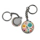 Porte clés - fleurs- cabochon verre ou résine