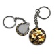 Porte clés - fleur exotique noire et dorée- cabochon verre ou résine, miroirs, porte clés
