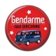 Cabochon Résine - gendarme qui déchire