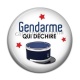 Cabochon Résine - gendarme qui déchire