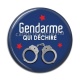 Cabochon Résine - gendarme qui déchire