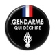 Cabochon Résine - gendarme qui déchire