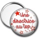 Miroir de poche - une directrice au top