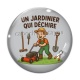 Cabochon Verre - un jardinier qui déchire
