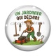 Cabochon Verre - un jardinier qui déchire