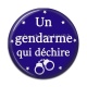 Cabochon Résine - un gendarme qui déchire