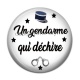 Cabochon Résine - un gendarme qui déchire
