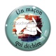 Cabochon Verre - un maçon qui déchire