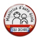 Cabochon Verre - monitrice d'auto école qui déchire