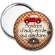 Miroir de poche - monitrice d'auto école qui déchire