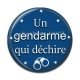Cabochon Résine - un gendarme qui déchire