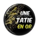 Cabochon Résine - une tatie en or