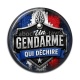 Cabochon Résine - un gendarme qui déchire
