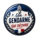 Cabochon Résine - un gendarme qui déchire