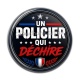 Cabochon Résine - un policier qui déchire